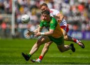 18 July 2021; Patrick McBrearty of Donegal in action against Brian Kennedy of Tyrone during the Ulster GAA Football Senior Championship Semi-Final match between Donegal and Tyrone at Brewster Park in Enniskillen, Fermanagh. Photo by Ben McShane/Sportsfile