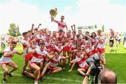 18 July 2021; Derry captain Matthew Downey lifts the cup as his team-mates celebrate after the 2020 Electric Ireland GAA Football All-Ireland Minor Championship Final match between Derry and Kerry at Bord Na Mona O’Connor Park in Tullamore. Photo by Matt Browne/Sportsfile