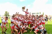 18 July 2021; Derry captain Matthew Downey lifts the cup as his team-mates celebrate after the 2020 Electric Ireland GAA Football All-Ireland Minor Championship Final match between Derry and Kerry at Bord Na Mona O’Connor Park in Tullamore. Photo by Matt Browne/Sportsfile