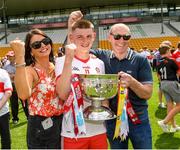 18 July 2021; Derry captain Matthew Downey with his mother Michele and father Henry, former Derry player and 1993 all Ireland winning team captain, after the 2020 Electric Ireland GAA Football All-Ireland Minor Championship Final match between Derry and Kerry at Bord Na Mona O’Connor Park in Tullamore. Photo by Matt Browne/Sportsfile