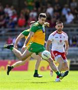18 July 2021; Caolan McGonigle of Donegal shoots to score his side's first goal despite the efforts of Conn Kilpatrick, right, and Pádraig Hempsey of Tyrone during the Ulster GAA Football Senior Championship Semi-Final match between Donegal and Tyrone at Brewster Park in Enniskillen, Fermanagh. Photo by Sam Barnes/Sportsfile