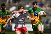 18 July 2021; Jamie Brennan of Donegal elbows Peter Harte of Tyrone during the Ulster GAA Football Senior Championship Semi-Final match between Donegal and Tyrone at Brewster Park in Enniskillen, Fermanagh. Photo by Ben McShane/Sportsfile