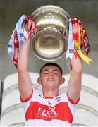 18 July 2021; Derry captain Matthew Downey lifts the cup  after the 2020 Electric Ireland GAA Football All-Ireland Minor Championship Final match between Derry and Kerry at Bord Na Mona O’Connor Park in Tullamore. Photo by Matt Browne/Sportsfile