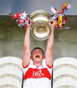 18 July 2021; Derry captain Matthew Downey lifts the cup  after the 2020 Electric Ireland GAA Football All-Ireland Minor Championship Final match between Derry and Kerry at Bord Na Mona O’Connor Park in Tullamore. Photo by Matt Browne/Sportsfile