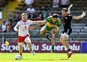 18 July 2021; Caolan McGonigle of Donegal in action against Frank Burns of Tyrone, left, and Tyrone goalkeeper Niall Morgan during the Ulster GAA Football Senior Championship Semi-Final match between Donegal and Tyrone at Brewster Park in Enniskillen, Fermanagh. Photo by Sam Barnes/Sportsfile