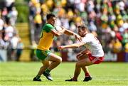 18 July 2021; Paul Brennan of Donegal in action against Niall Sludden of Tyrone during the Ulster GAA Football Senior Championship Semi-Final match between Donegal and Tyrone at Brewster Park in Enniskillen, Fermanagh. Photo by Sam Barnes/Sportsfile