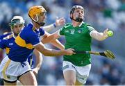 18 July 2021; Peter Casey of Limerick is tackled by Barry Heffernan of Tipperary during the Munster GAA Hurling Senior Championship Final match between Limerick and Tipperary at Páirc Uí Chaoimh in Cork. Photo by Piaras Ó Mídheach/Sportsfile