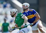 18 July 2021; Cian Lynch of Limerick is tackled by Pádraic Maher of Tipperary during the Munster GAA Hurling Senior Championship Final match between Limerick and Tipperary at Páirc Uí Chaoimh in Cork. Photo by Piaras Ó Mídheach/Sportsfile