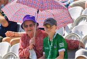 18 July 2021; Limerick supporter Mark O'Grady, age 10, with his grandmother Gemma, from Monaleen, before the Munster GAA Hurling Senior Championship Final match between Limerick and Tipperary at Páirc Uí Chaoimh in Cork. Photo by Ray McManus/Sportsfile
