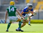 18 July 2021; Alan Flynn of Tipperary in action against Seámus Flanagan of Limerick during the Munster GAA Hurling Senior Championship Final match between Limerick and Tipperary at Páirc Uí Chaoimh in Cork. Photo by Piaras Ó Mídheach/Sportsfile