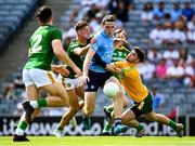 18 July 2021; Brian Fenton of Dublin is tackled by Meath goalkeeper Harry Hogan during the Leinster GAA Senior Football Championship Semi-Final match between Dublin and Meath at Croke Park in Dublin. Photo by Eóin Noonan/Sportsfile