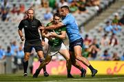 18 July 2021; Bryan McMahon of Meath is tackled by James McCarthy of Dublin during the Leinster GAA Senior Football Championship Semi-Final match between Dublin and Meath at Croke Park in Dublin. Photo by Harry Murphy/Sportsfile