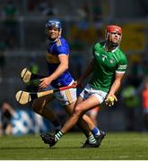 18 July 2021; Barry Nash of Limerick in action against Jason Forde of Tipperary during the Munster GAA Hurling Senior Championship Final match between Limerick and Tipperary at Páirc Uí Chaoimh in Cork. Photo by Ray McManus/Sportsfile