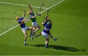 18 July 2021; Séamus Callanan, left, and John O'Dwyer of Tipperary in action against Richie English, left, and Seán Finn of Limerick during the Munster GAA Hurling Senior Championship Final match between Limerick and Tipperary at Páirc Uí Chaoimh in Cork. Photo by Daire Brennan/Sportsfile