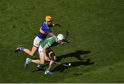 18 July 2021; Aaron Gillane of Limerick in action against Barry Heffernan of Tipperary during the Munster GAA Hurling Senior Championship Final match between Limerick and Tipperary at Páirc Uí Chaoimh in Cork. Photo by Daire Brennan/Sportsfile