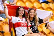 18 July 2021; Derry supporters Jamie-Leigh Hazlett, left, and Orlaith McDermott at the 2020 Electric Ireland GAA Football All-Ireland Minor Championship Final match between Derry and Kerry at Bord Na Mona O’Connor Park in Tullamore. Photo by Matt Browne/Sportsfile
