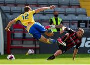 18 July 2021; Keith Ward of Bohemians in action against Aaron O'Driscoll of Longford Town during the SSE Airtricity League Premier Division match between Bohemians and Longford Town at Dalymount Park in Dublin. Photo by Michael P Ryan/Sportsfile