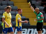 18 July 2021; Aodh Dervin of Longford Town receives a yellow card from referee Neil Doyle during the SSE Airtricity League Premier Division match between Bohemians and Longford Town at Dalymount Park in Dublin. Photo by Michael P Ryan/Sportsfile