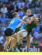 18 July 2021; Cillian O'Sullivan of Meath is tackled by Con O'Callaghan, left, and Jonny Cooper of Dublin during the Leinster GAA Senior Football Championship Semi-Final match between Dublin and Meath at Croke Park in Dublin. Photo by Eóin Noonan/Sportsfile