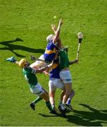 18 July 2021; Séamus Flanagan, left, and Conor Boylan of Limerick in action against Pádraic Maher, left, and Séamus Kennedy of Tipperary during the Munster GAA Hurling Senior Championship Final match between Limerick and Tipperary at Páirc Uí Chaoimh in Cork. Photo by Daire Brennan/Sportsfile