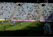 18 July 2021; Cormac Costello of Dublin kicks a point late in the game as Dublin and Meath players and supporters look on during the Leinster GAA Senior Football Championship Semi-Final match between Dublin and Meath at Croke Park in Dublin. Photo by Harry Murphy/Sportsfile