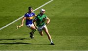 18 July 2021; Kyle Hayes of Limerick races past Dan McCormack of Tipperary on his way to score his side's second goal , in the 54th minute,  during the Munster GAA Hurling Senior Championship Final match between Limerick and Tipperary at Páirc Uí Chaoimh in Cork. Photo by Ray McManus/Sportsfile