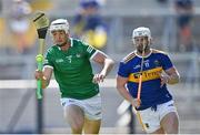 18 July 2021; Kyle Hayes of Limerick gets past Michael Breen of Tipperary during the Munster GAA Hurling Senior Championship Final match between Limerick and Tipperary at Páirc Uí Chaoimh in Cork. Photo by Piaras Ó Mídheach/Sportsfile