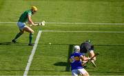 18 July 2021; Séamus Flanagan of Limerick taps the sliotar past Tipperary goalkeeper Barry Hogan and Pádraic Maher to score a goal in the 42nd minute during the Munster GAA Hurling Senior Championship Final match between Limerick and Tipperary at Páirc Uí Chaoimh in Cork. Photo by Ray McManus/Sportsfile