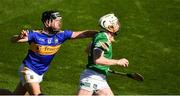 18 July 2021; Cian Lynch of Limerick is tackled by Dan McCormack of Tipperary  during the Munster GAA Hurling Senior Championship Final match between Limerick and Tipperary at Páirc Uí Chaoimh in Cork. Photo by Ray McManus/Sportsfile