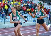 18 July 2021; Lauren McCourt, right, after passing the baton to team-mate Caoimhe Cronin of Ireland in the final of women's 4x400m Relay during day four of the European Athletics U20 Championships at the Kadriorg Stadium in Tallinn, Estonia. Photo by Marko Mumm/Sportsfile