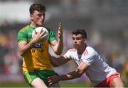 18 July 2021; Niall O'Donnell of Donegal and Darren McCurry of Tyrone during the Ulster GAA Football Senior Championship Semi-Final match between Donegal and Tyrone at Brewster Park in Enniskillen, Fermanagh. Photo by Ben McShane/Sportsfile