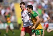 18 July 2021; Conor Meyler of Tyrone holds the shirt of Eoin McHugh of Donegal during the Ulster GAA Football Senior Championship Semi-Final match between Donegal and Tyrone at Brewster Park in Enniskillen, Fermanagh. Photo by Ben McShane/Sportsfile