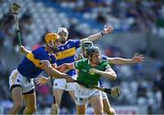 18 July 2021; Peter Casey of Limerick in action against Tipperary players, from left, Barry Heffernan, Brendan Maher and Cathal Barrett during the Munster GAA Hurling Senior Championship Final match between Limerick and Tipperary at Páirc Uí Chaoimh in Cork. Photo by Piaras Ó Mídheach/Sportsfile