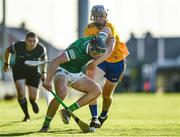 19 July 2021; Aidan Moriarty of Clare in action against Aidan O'Connor of Limerick during the Munster GAA Hurling U20 Championship semi-final match between Limerick and Clare at the LIT Gaelic Grounds in Limerick. Photo by Ben McShane/Sportsfile