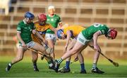 19 July 2021; Limerick players Bryan Nix, left, and Donnacha O'Dalaigh contest for possession against Clare players Mike Gough, left, and Adam Mungovan during the Munster GAA Hurling U20 Championship semi-final match between Limerick and Clare at the LIT Gaelic Grounds in Limerick. Photo by Ben McShane/Sportsfile