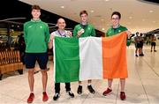 19 July 2021; Cian McPhillips of Ireland with coach Joe Ryan, Eoin Quinn and Oisin Lane and his Men's 1500m gold medal at Dublin Airport as Team Ireland return home from the European U20 Athletics Championships. Photo by Sam Barnes/Sportsfile