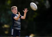 20 July 2021; Ryan Russell, age 9, in action during the Bank of Ireland Leinster Rugby Summer Camp at Balbriggan RFC in Dublin. Photo by Matt Browne/Sportsfile