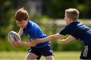 20 July 2021; Callum Daly, age 10, in action during the Bank of Ireland Leinster Rugby Summer Camp at Balbriggan RFC in Dublin. Photo by Matt Browne/Sportsfile