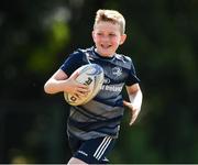 20 July 2021; Ryan Russell, age 9, in action during the Bank of Ireland Leinster Rugby Summer Camp at Balbriggan RFC in Dublin. Photo by Matt Browne/Sportsfile