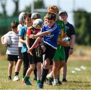 20 July 2021; Jenson Barugh, age 9, in action during the Bank of Ireland Leinster Rugby Summer Camp at Balbriggan RFC in Dublin. Photo by Matt Browne/Sportsfile