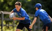 20 July 2021; John Loughnane, age 10, in action during the Bank of Ireland Leinster Rugby Summer Camp at Balbriggan RFC in Dublin. Photo by Matt Browne/Sportsfile