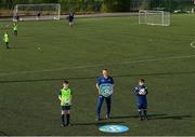 20 July 2021; Republic of Ireland Under-21 Manager Jim Crawford with Matthew McCarthy, aged 14, from Carrigdine, left, and David Wall, aged 15, from Wilton, during Football For All INTERsport Elverys Summer Soccer School at Carrigaline United AFC, Carrigaline in Cork. Photo by Harry Murphy/Sportsfile