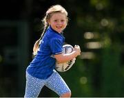 20 July 2021; Maisie Healy, age 6, in action during the Bank of Ireland Leinster Rugby Summer Camp at Balbriggan RFC in Dublin. Photo by Matt Browne/Sportsfile