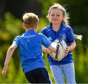 20 July 2021; Maisie Healy, age 6, in action during the Bank of Ireland Leinster Rugby Summer Camp at Balbriggan RFC in Dublin. Photo by Matt Browne/Sportsfile