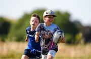 20 July 2021; Milo McGrane, age 6, in action during the Bank of Ireland Leinster Rugby Summer Camp at Balbriggan RFC in Dublin. Photo by Matt Browne/Sportsfile