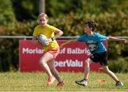 20 July 2021; Chloe Savage, age 11, in action during the Bank of Ireland Leinster Rugby Summer Camp at Balbriggan RFC in Dublin. Photo by Matt Browne/Sportsfile