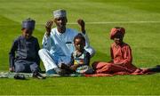 20 July 2021; The Musa family of Zainab, left, Abdullahi, Fatima and dad Masoud, from Nigeria, on the pitch during the celebration of Eid Al-Adha at Croke Park in Dublin. Photo by Ray McManus/Sportsfile