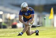 20 July 2021; Devon Ryan of Tipperary takes a sideline cut during the Munster GAA Hurling U20 Championship semi-final match between Tipperary and Cork at Semple Stadium in Thurles, Tipperary. Photo by Ben McShane/Sportsfile
