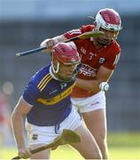 20 July 2021; Paddy Creedon of Tipperary in action against Dáire O'Leary of Cork during the Munster GAA Hurling U20 Championship semi-final match between Tipperary and Cork at Semple Stadium in Thurles, Tipperary. Photo by Ben McShane/Sportsfile