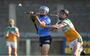 20 July 2021; Dara Purcell of Dublin in action against Padraic Watkins of Offaly during the Leinster GAA Hurling U20 Championship semi-final match between Dublin and Offaly at Parnell Park in Dublin. Photo by Daire Brennan/Sportsfile